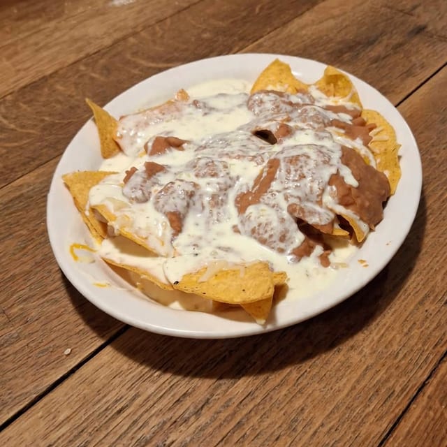 Nachos with Choice of One Topping.